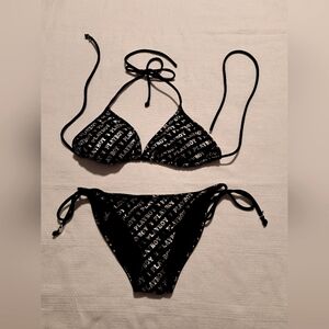 Playboy women's bikini fits size Small & Medium tie up depending on cove…